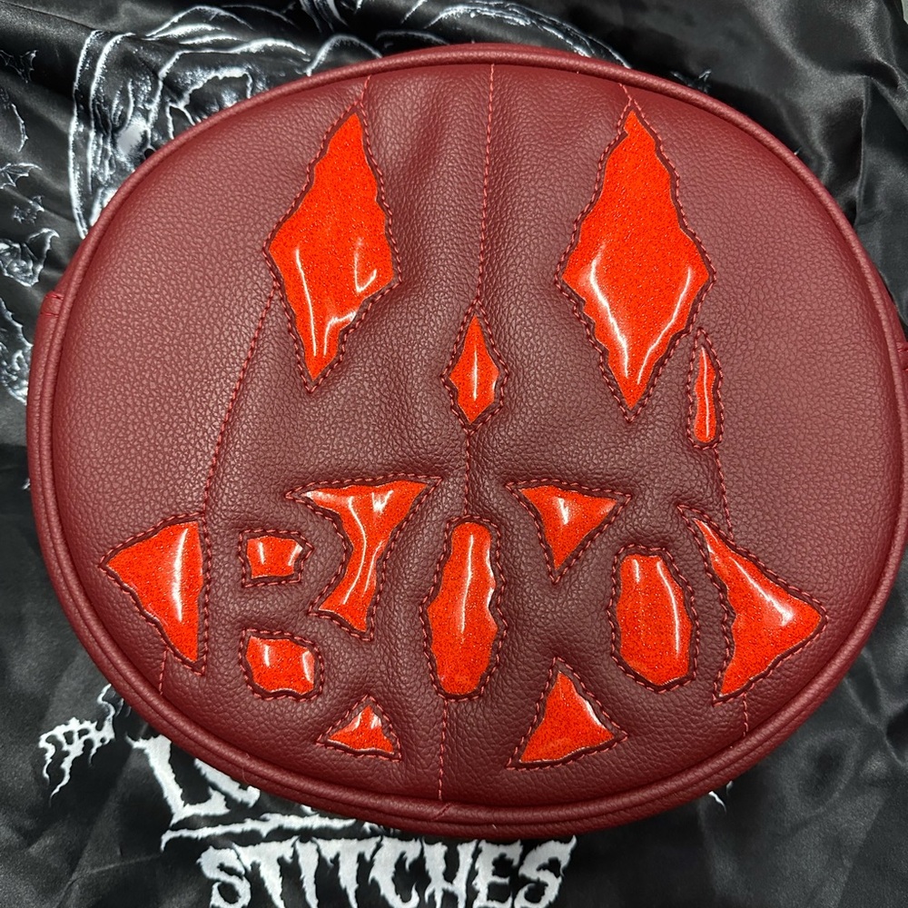 Love pain and stitches handmade purse